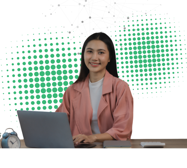 Smiling woman sitting at a laptop